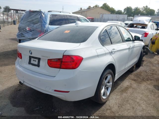 WBA3B1C5XEP679811 BMW 320i