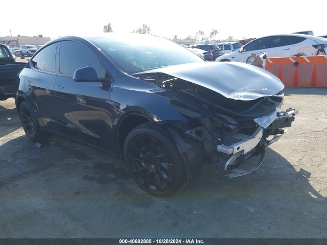 2024 TESLA MODEL Y 7SAYGDEE1RF006014 Photo 0