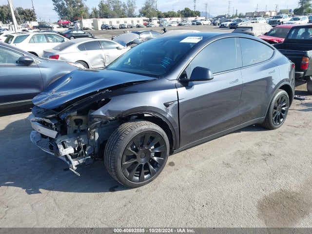 2024 TESLA MODEL Y 7SAYGDEE1RF006014 Photo 1
