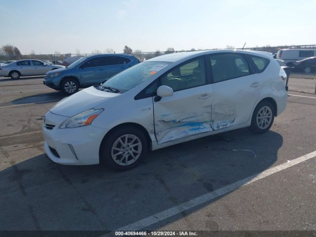 JTDZN3EU6EJ010622 Toyota Prius V Three