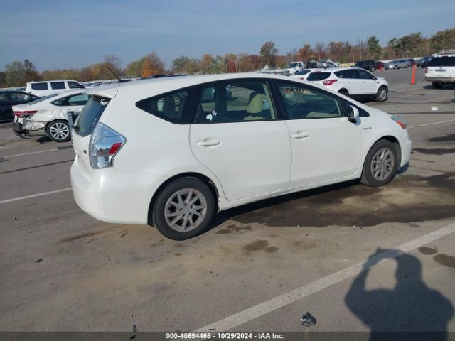 JTDZN3EU6EJ010622 Toyota Prius V Three