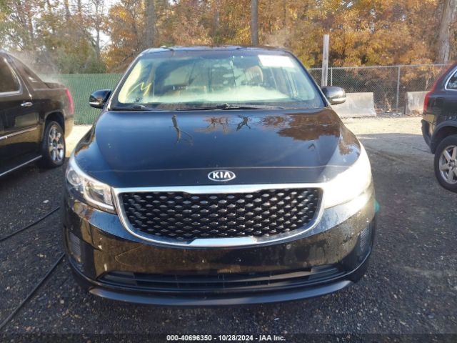 KNDMB5C19H6237852 KIA SEDONA LX