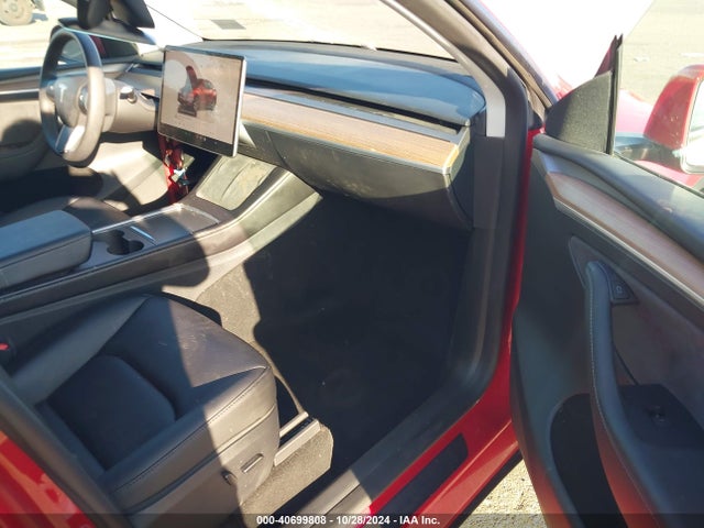 2023 TESLA MODEL Y 7SAYGDED8PF934455 Photo 4