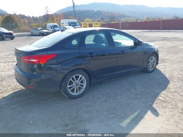 Ford FOCUS SE 2016 1FADP3F24GL237323 Image 4
