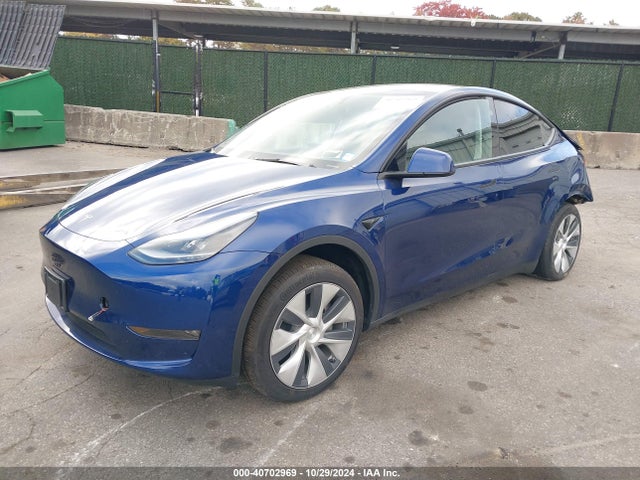 2024 TESLA MODEL Y 7SAYGDEE9RF035101 Photo 1