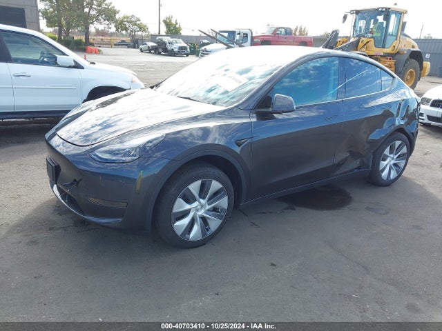 2024 TESLA MODEL Y 7SAYGDED8RF085723 Photo 1