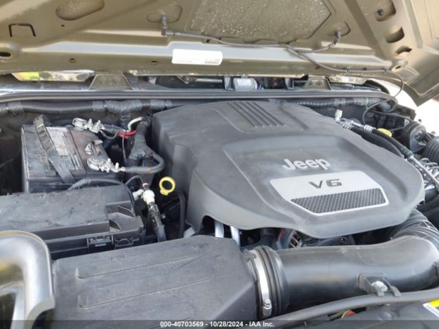 1C4BJWDG9FL599827 Jeep Wrangler Unlimited Sport