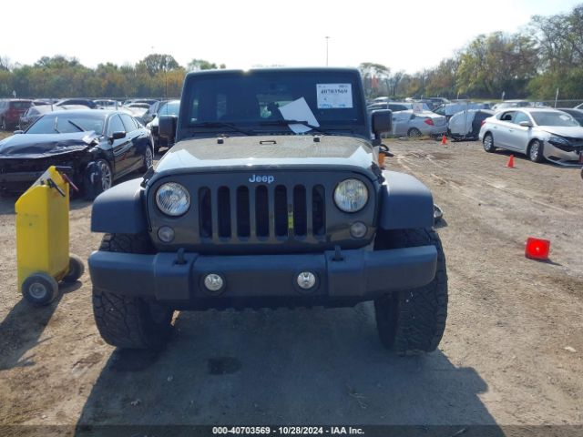 1C4BJWDG9FL599827 Jeep Wrangler Unlimited Sport