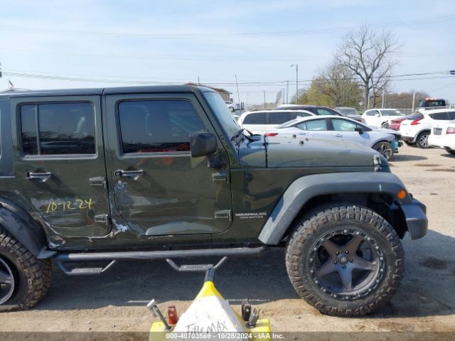 1C4BJWDG9FL599827 Jeep Wrangler Unlimited Sport