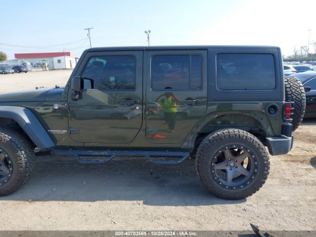 1C4BJWDG9FL599827 Jeep Wrangler Unlimited Sport