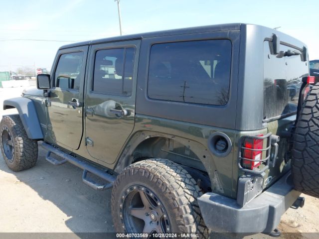 1C4BJWDG9FL599827 Jeep Wrangler Unlimited Sport