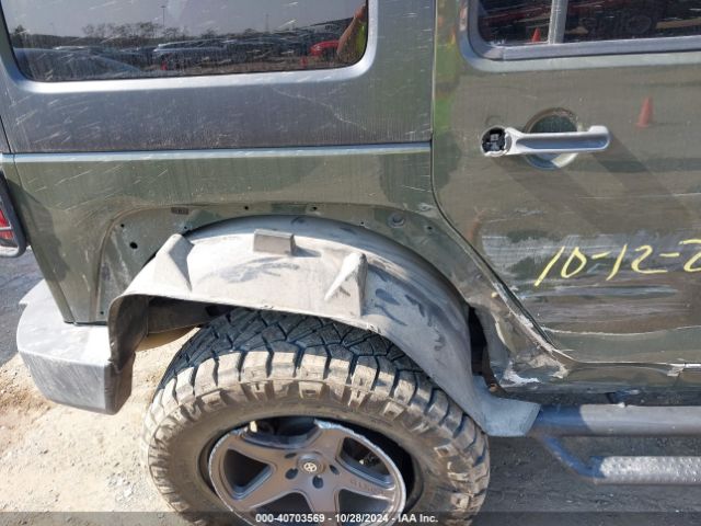 1C4BJWDG9FL599827 Jeep Wrangler Unlimited Sport