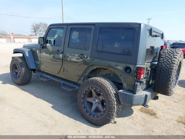 1C4BJWDG9FL599827 Jeep Wrangler Unlimited Sport