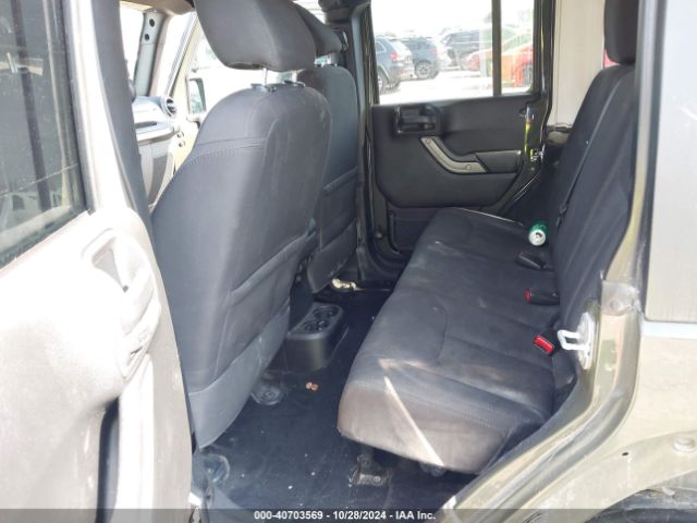 1C4BJWDG9FL599827 Jeep Wrangler Unlimited Sport