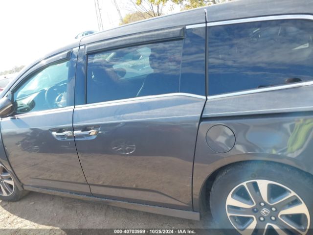 5FNRL5H94FB060999 Honda Odyssey Touring/touring Elite