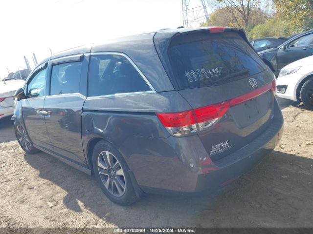 5FNRL5H94FB060999 Honda Odyssey Touring/touring Elite
