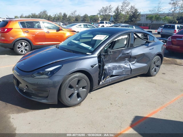 2023 TESLA MODEL 3 5YJ3E1EAXPF700657 Photo 1