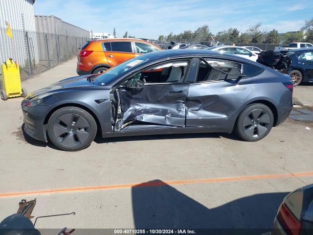 2023 TESLA MODEL 3 5YJ3E1EAXPF700657 Photo 5