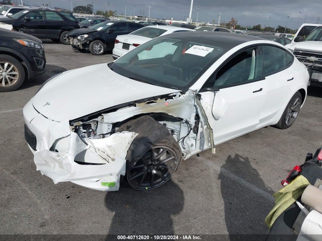 2023 TESLA MODEL 3 5YJ3E1EA9PF460369 Photo 1