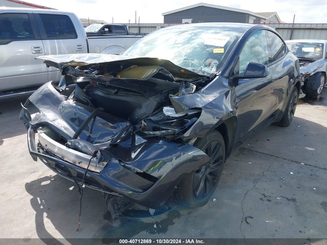 2024 TESLA MODEL Y 7SAYGAEE0RF104028 Photo 1