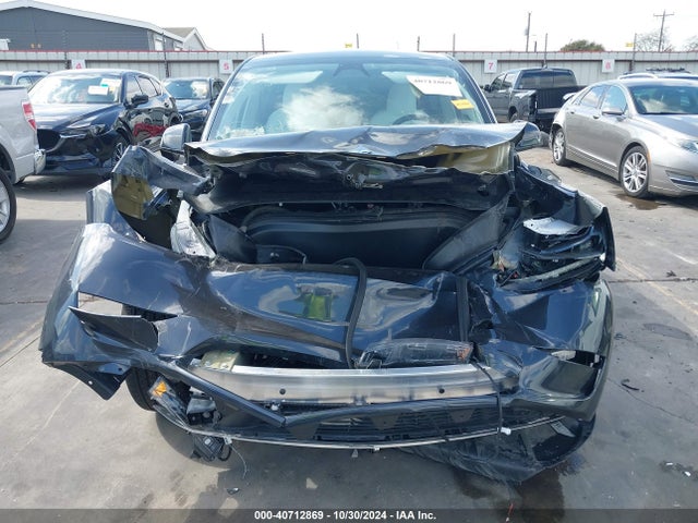 2024 TESLA MODEL Y 7SAYGAEE0RF104028 Photo 5