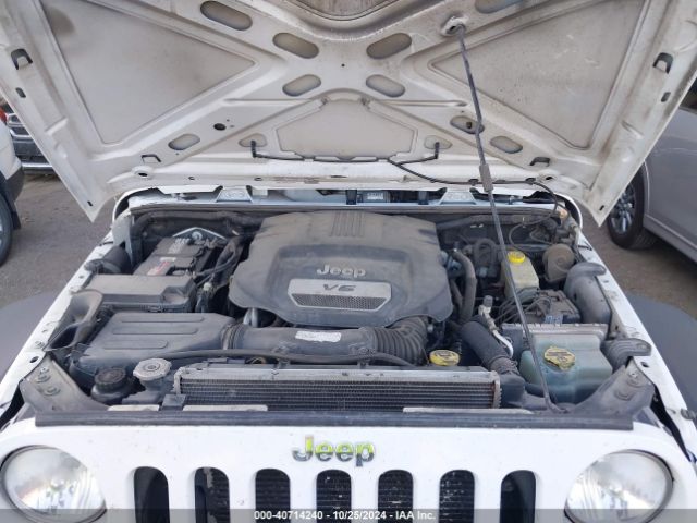 1C4BJWDG5EL307993 Jeep Wrangler Unlimited Sport