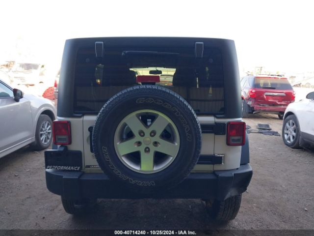 1C4BJWDG5EL307993 Jeep Wrangler Unlimited Sport