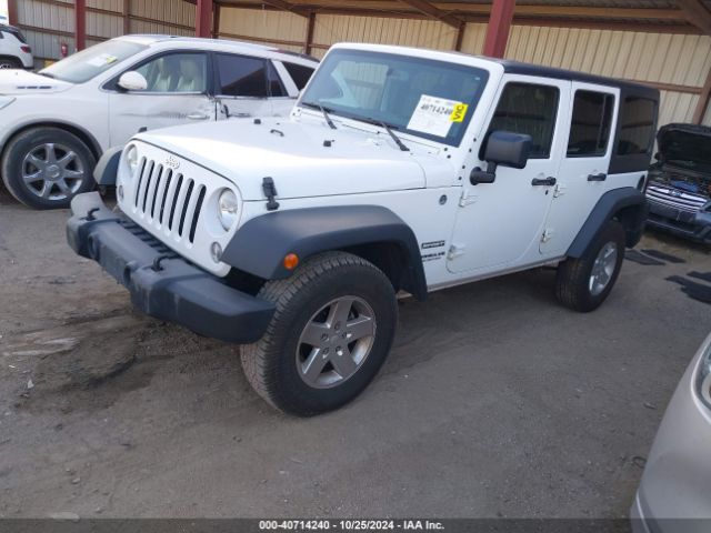 1C4BJWDG5EL307993 Jeep Wrangler Unlimited Sport