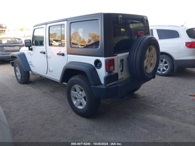 1C4BJWDG5EL307993 Jeep Wrangler Unlimited Sport