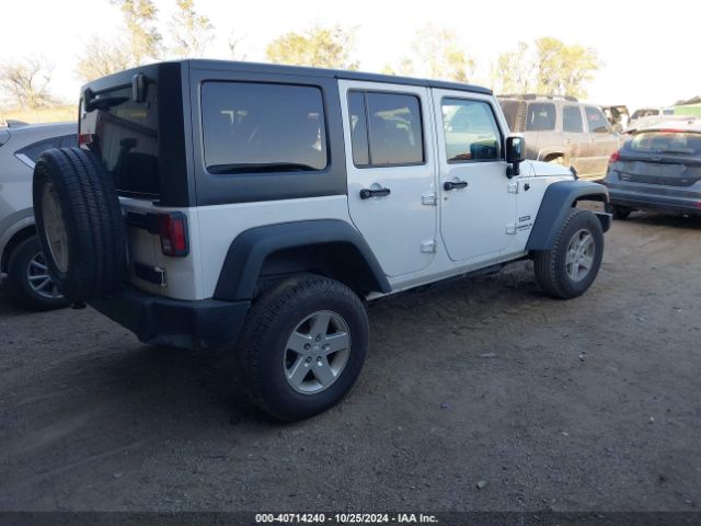 1C4BJWDG5EL307993 Jeep Wrangler Unlimited Sport
