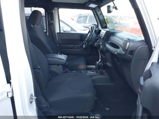 1C4BJWDG5EL307993 Jeep Wrangler Unlimited Sport