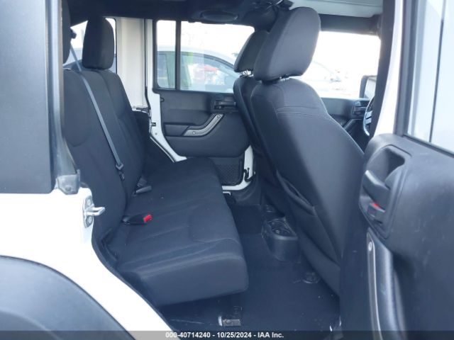 1C4BJWDG5EL307993 Jeep Wrangler Unlimited Sport