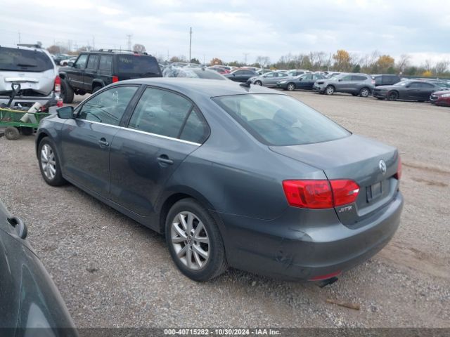 3VWD17AJ5EM203529 Volkswagen Jetta 1.8t Se