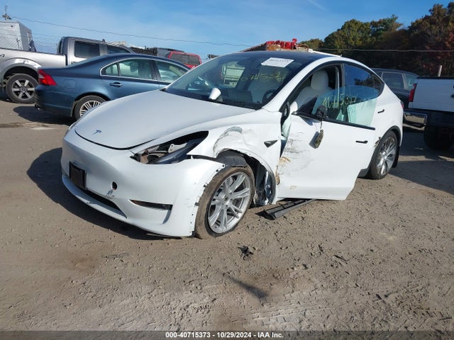 2023 TESLA MODEL Y 7SAYGDEEXPF876275 Photo 1