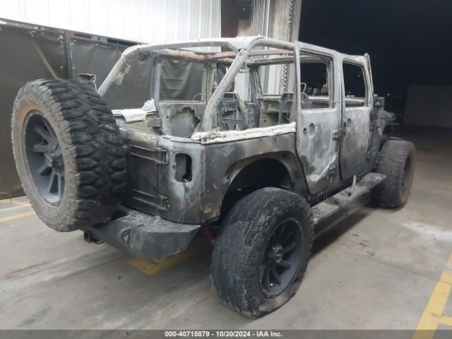 1C4BJWDG0GL129087 Jeep Wrangler Unlimited Sport