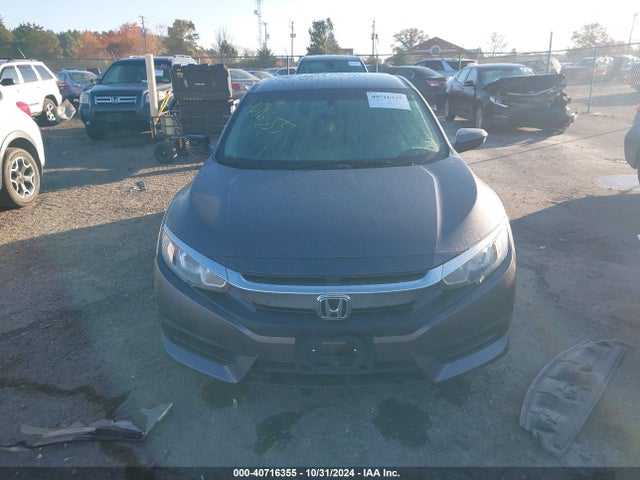 Продаж на аукціоні авто 2018 Honda Civic Lx, vin: 19XFC2F5XJE043821, номер лоту: 40716355