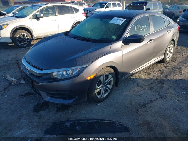 Продаж на аукціоні авто 2018 Honda Civic Lx, vin: 19XFC2F5XJE043821, номер лоту: 40716355