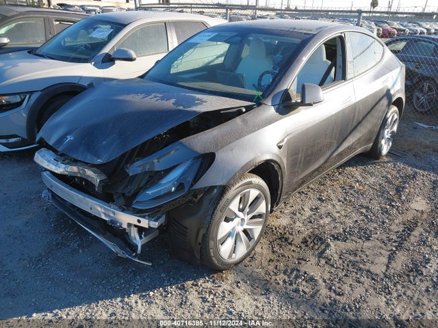 2024 TESLA MODEL Y 7SAYGDEE8RA231477 Photo 1