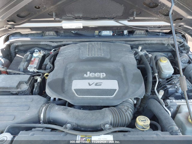 1C4AJWAG7GL313703 Jeep Wrangler Sport