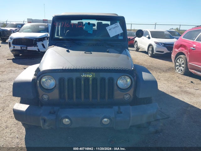 1C4AJWAG7GL313703 Jeep Wrangler Sport