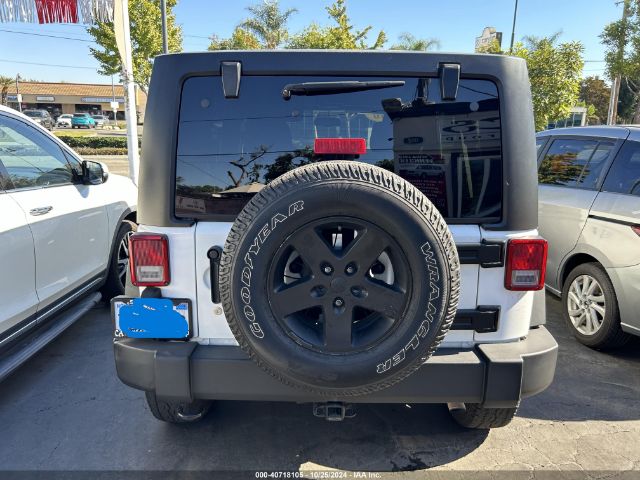 1C4BJWDGXGL129405 Jeep Wrangler Unlimited Sport