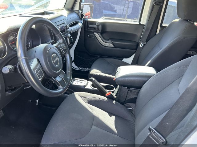 1C4BJWDGXGL129405 Jeep Wrangler Unlimited Sport
