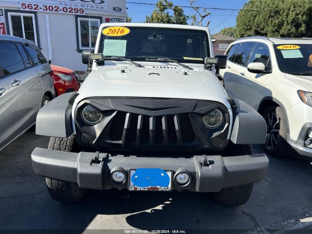 1C4BJWDGXGL129405 Jeep Wrangler Unlimited Sport