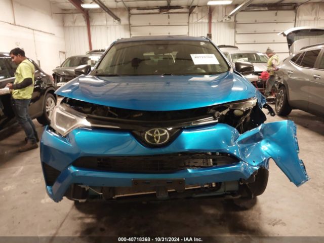 JTMBFREV1JJ228102 Toyota RAV4 LE