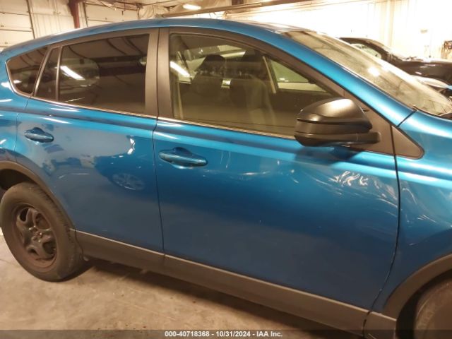 JTMBFREV1JJ228102 Toyota RAV4 LE
