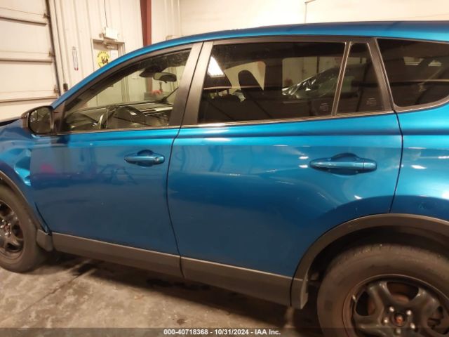 JTMBFREV1JJ228102 Toyota RAV4 LE