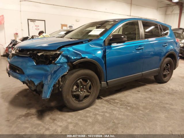 JTMBFREV1JJ228102 Toyota RAV4 LE