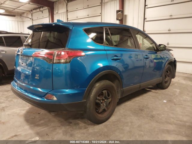 JTMBFREV1JJ228102 Toyota RAV4 LE