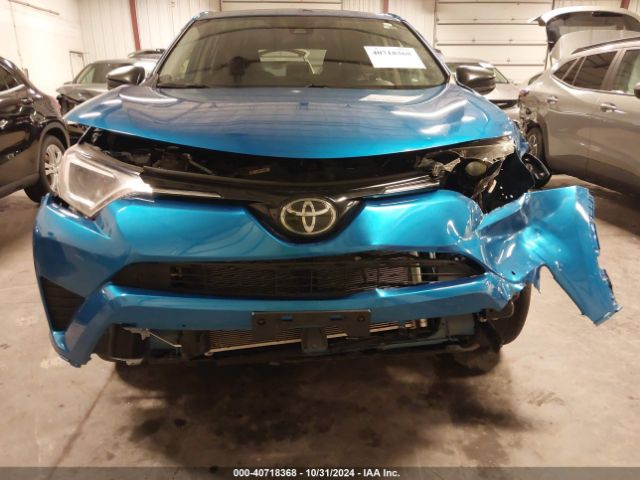 JTMBFREV1JJ228102 Toyota RAV4 LE