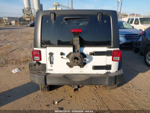 1C4BJWDG4FL749956 Jeep Wrangler Unlimited Sport